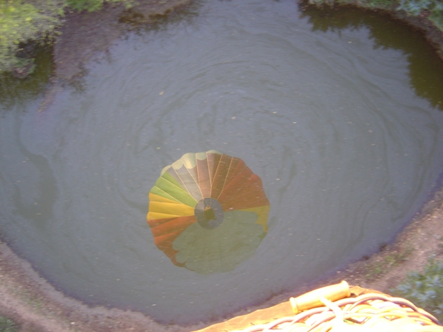 As Amy and Emily drifted over a pond, they captured the moment.