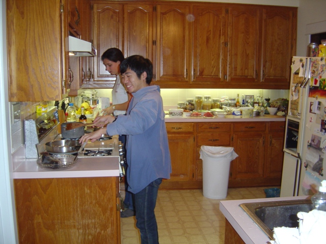 Qi,Emily's Chinese friend from school, preparing a fabulous five-course meal for us during Thanksgiving break.