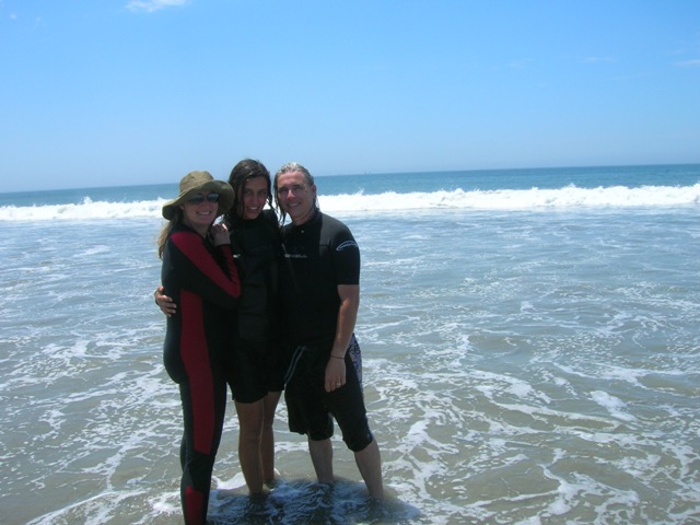 Emily just out of the water from boogie boarding in San Diego with friends Eric and Tina from the ship.