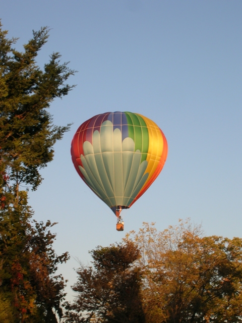 Hot air balloon before taking an evening landing.