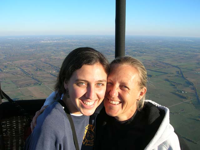 Amy and Emily floating over the countryside in a hot air balloon.